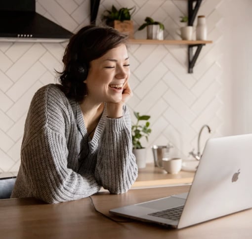 image of woman in videocall using laptop