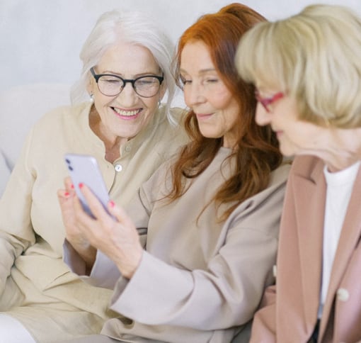  women in videocall using mobile